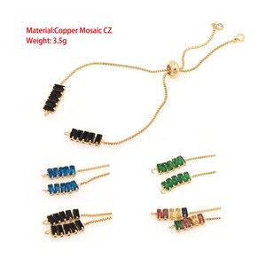 May include: A gold chain bracelet with a sliding clasp. The bracelet features a row of black, blue, green, or multi-colored rectangular stones. Material: Copper Mosaic CZ. Weight: 3.5g