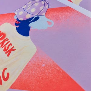 May include: A graphic art print featuring a stylized figure wearing a purple polka-dot baseball cap and a cream-colored t-shirt with the red text RISK printed on the front. The background consists of a large red triangle set against a light purple field.