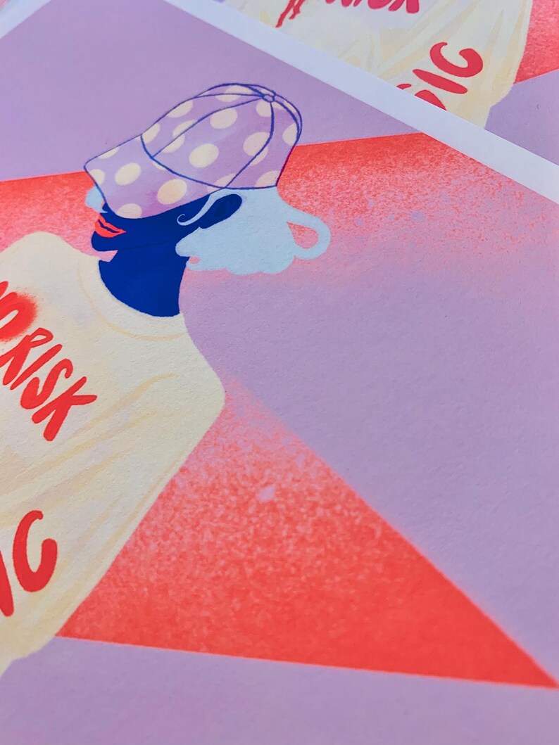 May include: A graphic art print featuring a stylized figure wearing a purple polka-dot baseball cap and a cream-colored t-shirt with the red text RISK printed on the front. The background consists of a large red triangle set against a light purple field.