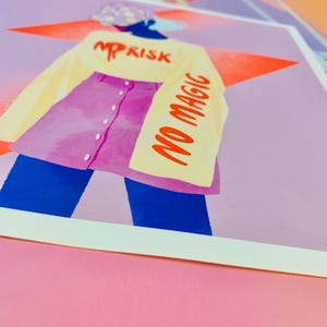 May include: A square art print featuring a stylized illustration of a figure wearing a yellow long-sleeve shirt with the red text NO RISK and NO MAGIC, paired with a purple button-down skirt and dark blue pants, set against a large orange star.