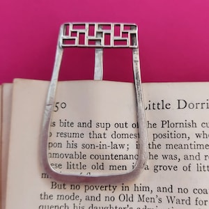 Substantial and impressive sterling silver bookmark with stylish rectangle decoration.
