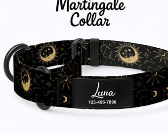May include: Black Martingale dog collar with a celestial design featuring gold suns, moons, and stars. The collar includes a black name tag with the name "Luna" and a phone number. The collar is designed for dogs.