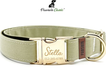 May include: A light green dog collar with a gold buckle and a brown leather tag that says "PAWSWIN". The buckle has the name "Stella" and a phone number engraved on it.