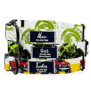 May include: Three colorful dog collars with black hardware and white backgrounds. The collars feature a green monster truck, a red monster truck, and a yellow monster truck. Each collar has a black tag with white text that includes a name, phone number, and additional information. The text on the tags reads "Max 123-456-7890", "Gus 123-456-7890 Microchipped", and "Tucker 123-456-7890 7 Apple Dr."
