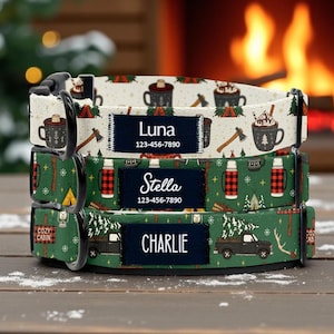 Puede incluir: Tres collares personalizados para perros con diseños de temática de camping. El collar superior es de color crema con tazas y hachas, el del medio es verde con termos de cuadros rojos y el inferior es verde con una camioneta negra. Cada uno tiene un nombre y un número de teléfono.