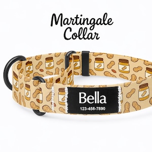 May include: A tan Martingale collar featuring a repeating pattern of peanut butter jars and peanuts. The collar includes black metal hardware and a rectangular black name tag stitched onto the front with the white text Bella and 123-456-7890.