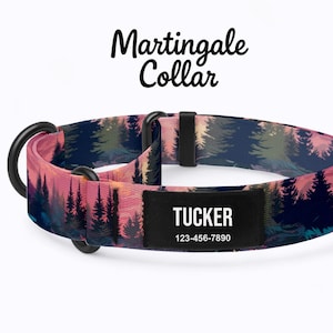 May include: A Martingale dog collar with a forest scene design in pink, blue, and green. The collar has a black metal ring and a black name tag that reads "TUCKER" and a phone number.