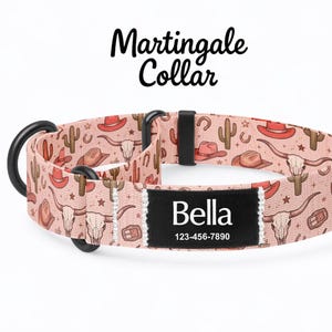 May include: A pink Martingale collar featuring a repeating pattern of cowboy hats, cacti, horseshoes, and longhorn skulls. A black rectangular nameplate is stitched to the front, displaying the white text Bella and 123-456-7890.