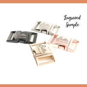 May include: Four engraved dog collar buckles in different finishes: silver, black, gold, and rose gold. Each buckle has the name "Bella" and a phone number engraved on it. The buckles are arranged in a semi-circle with the text "Engraved Sample" above them.