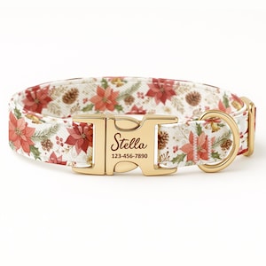 May include: A seasonal dog collar featuring a white background with a pattern of red poinsettias, pinecones, and foliage. The gold-coloured buckle displays the name "Stella" and a phone number. This pet collar is a festive accessory.