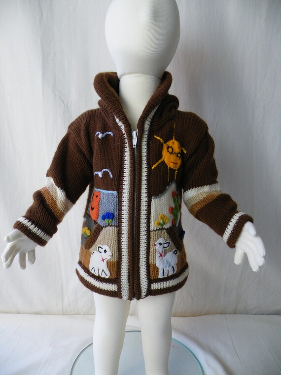 Peruvian arpillera childs/kids sweater/cardigan with embroidery/applique work. Size 6/9 mths L=30cm W=25cm I/A=23cm Fair Trade.