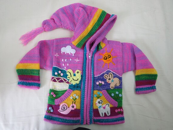 Peruvian arpillera childs/kids sweater/cardigan with embroidery/applique work.Size 9/12 mths .L=32 cm W=26 cm I/A=22 cm Fair Trade.