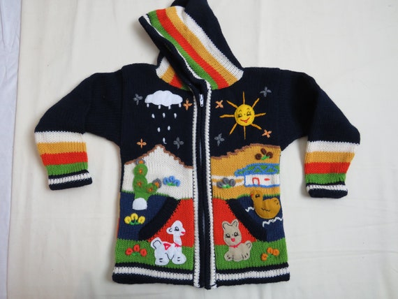 Peruvian arpillera childs/kids sweater/cardigan with embroidery/applique work. Size 3/4 Yrs L=40cm W=30cm I/A= 29cm Fair Trade.