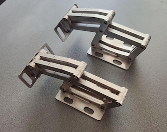 Bisagras de tijera reforzadas para paneles de acceso a trampillas de gran tamaño. Herrajes y accesorios para puertas batientes. Junta articulada de acero inoxidable.