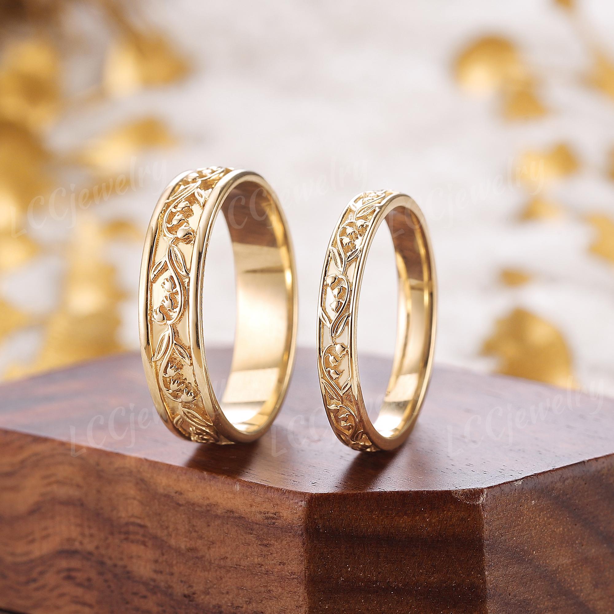 スズランデザインのペアリング2個セット、イエローゴールドの結婚指輪 