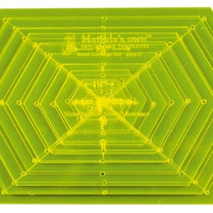 May include: A transparent chartreuse quilting template with a nested hexagonal design. The template has the text "Matilda's Own" and "Small Cottage Gee VH817". The template also has measurements of 3.18 cm.