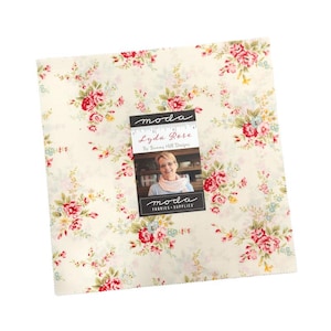 May include: A square of fabric featuring a floral design in red, pink, and yellow on a cream backdrop. The fabric is labelled "Lyda Rose" by Bunny Hill Designs, with the Moda Fabrics logo.