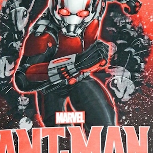 May include: A red and black Ant-Man superhero character with a helmet and red glowing eyes. The character is standing in front of a black and white background with the word "MARVEL" and "ANT-MAN" in red letters.