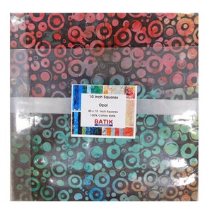 May include: A pack of 40 10-inch squares of 100% cotton batik fabric. The fabric has a black background with a pattern of red, pink, blue, and green circles. The pack label reads "10 Inch Squares Opal 40 x 10 Inch Squares 100% Cotton Batik BATIK AUSTRALIA".