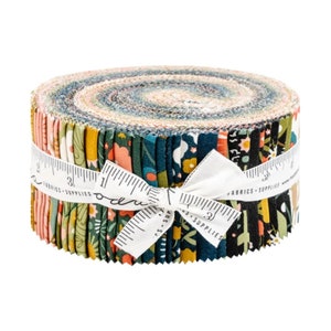 May include: A roll of fabric featuring a variety of floral prints in shades of green, blue, yellow, and pink. The fabric is tied with a white ribbon and a measuring tape that reads "Fabrics + Supplies".