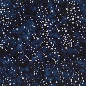 May include: Dark blue fabric with a speckled pattern of white dots, reminiscent of a starry night. The fabric has a mottled appearance, with variations in the blue hue. Suitable for various craft projects.