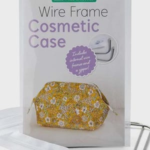 May include: A cosmetic case kit with wire frames, in a clear plastic package. The kit includes a yellow floral print cosmetic bag, a zipper, and wire frames. The package has the words "Wire Frame Cosmetic Case" printed on it.
