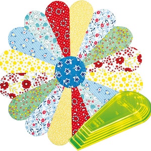May include: A colorful fabric flower design with various patterns and colors, including red, blue, yellow, and green. A clear, green plastic template is included, likely for quilting or crafting. The flower has a blue center with white star-shaped designs.