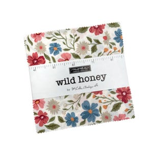 May include: A bundle of fabric squares featuring a floral design in red, blue, and pink hues against a white backdrop. The label reads "wild honey" by Jo's Little Boutique.