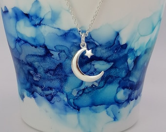 Collana girocollo da donna con ciondoli sovrapposti luna e stella in Argento 925 - Camporelli Gioielli