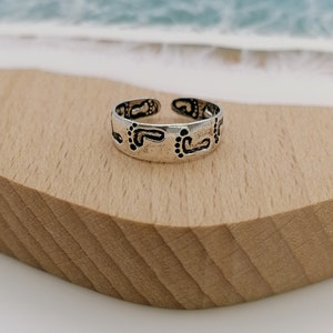 Footsteps in shop the sand ring