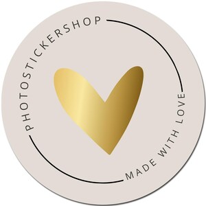 May include: A round sticker with a light beige background. A gold heart is in the center. The words "PHOTOTICKERSHOP" and "MADE WITH LOVE" are printed in black around the edge of the sticker.