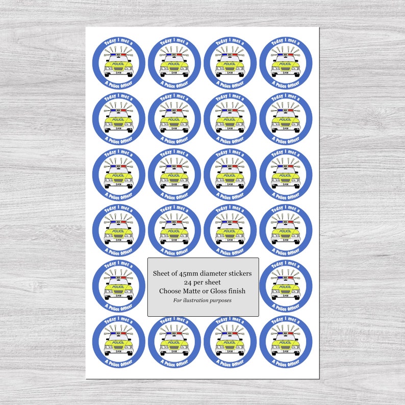 May include: Sheet of stickers featuring a yellow police car illustration within a blue circle. Each sticker has the text "Today I met a Police Officer". The sheet contains 24 stickers, each 45mm in diameter.