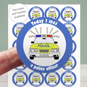May include: Sheet of stickers featuring a yellow police car with the word "POLICE" and the text "Today I met a police officer." The stickers have a blue border and the text "Two sizes and finishes available!"