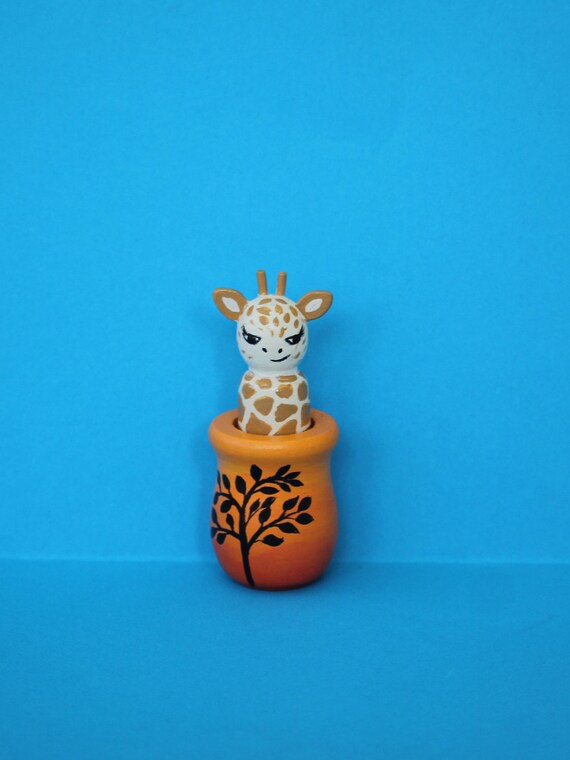 Wooden giraffe peg doll and pot | Etsy
