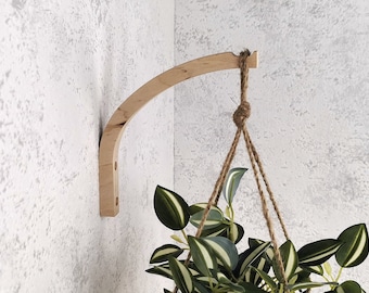 Moderne plantenhaak. Houten plantenhaak voor aan de muur. Houten haak voor het ophangen van planten. Houten plantenhanger. Beugel voor kamerplanten. Ophanghaak voor planten.