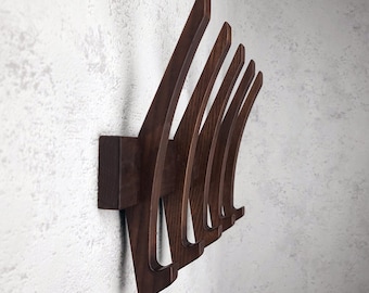 Modern coat rack in walnut color . Wall rack. Hat rack . Wooden hooks for clothes.