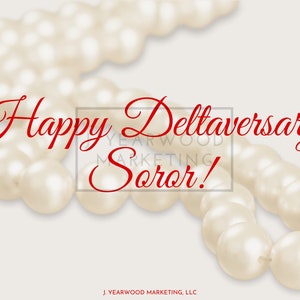 May include: A white pearl necklace with the text "Happy Deltaversary, Soror!" in red lettering.