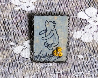 Storybook Cover Pin created from a vintage book cover from the 1950's, bear and flower