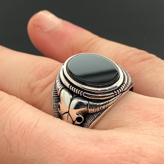 Zancan round silver signet ring with onyx stone.