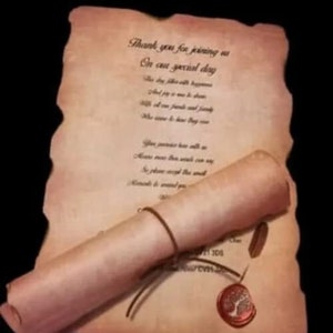 May include: A rolled up scroll with a brown string tied around it. The scroll is made of parchment paper and has a wax seal with a tree design. The scroll has text on it that reads "Thank you for joining us on our special day".