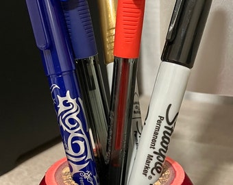 The Cricket Ball Pen Holder