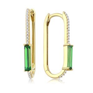 May include: Gold hoop earrings with a green emerald stone and pave diamonds.