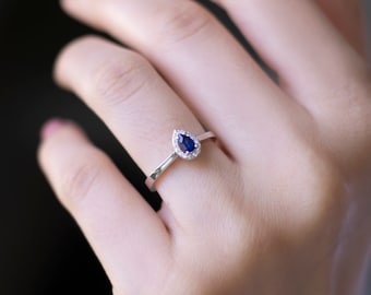 14k Gold Blue Sapphire Proposal Ring | Teardrop Cut Gem with Paved Diamonds