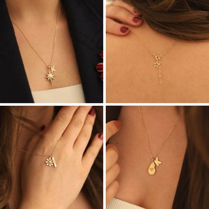 May include: Four close-up images of gold necklaces with different charms. The charms include a star, a flower, a heart, and a butterfly.