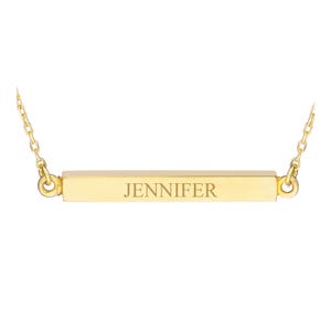 May include: A gold bar necklace with the name "JENNIFER" engraved on it.