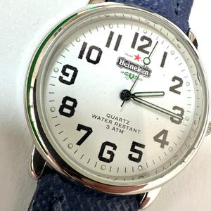 Vintage Heineken Uhr (1990er/2000er) – Komplettes Set, neu mit Film