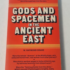 May include: A red book cover with the title "Gods and Spacemen in the Ancient East" by W. Raymond Drake. The book cover features a question about whether the female "demons" of the Middle Ages were real women from other planets.