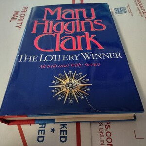 The Lottery Winner: Alvirah and Willy Stories by Mary Higgins Clark, 1st Edition & 1st Printing Hardcover ISBN 0671867164 Fiction, Vintage