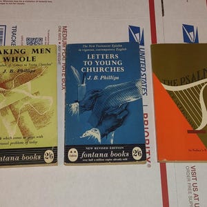 May include: Three vintage paperback books with colorful covers. Titles include "Making Men Whole," "Letters to Young Churches," and "The Psalms." The books are from Fontana Books and feature text and illustrations.