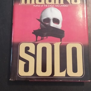 First Edition - SOLO By Jack Higgins Book Club Edition HCDJ Copyright 1980 & Published 1980 Like New